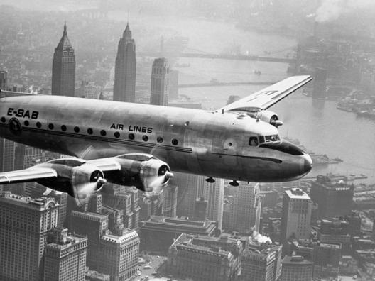 Aircraft Flying over City, 1946